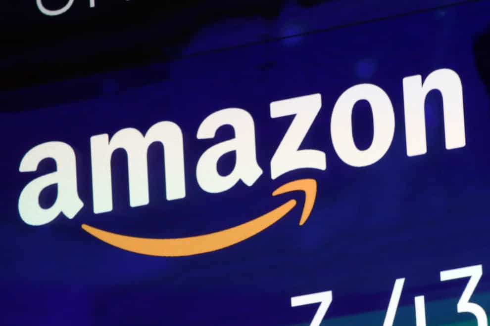 Visa and Amazon have announced an agreement that allows customers to use Visa cards on Amazon sites worldwide without additional fees (Richard Drew/AP)