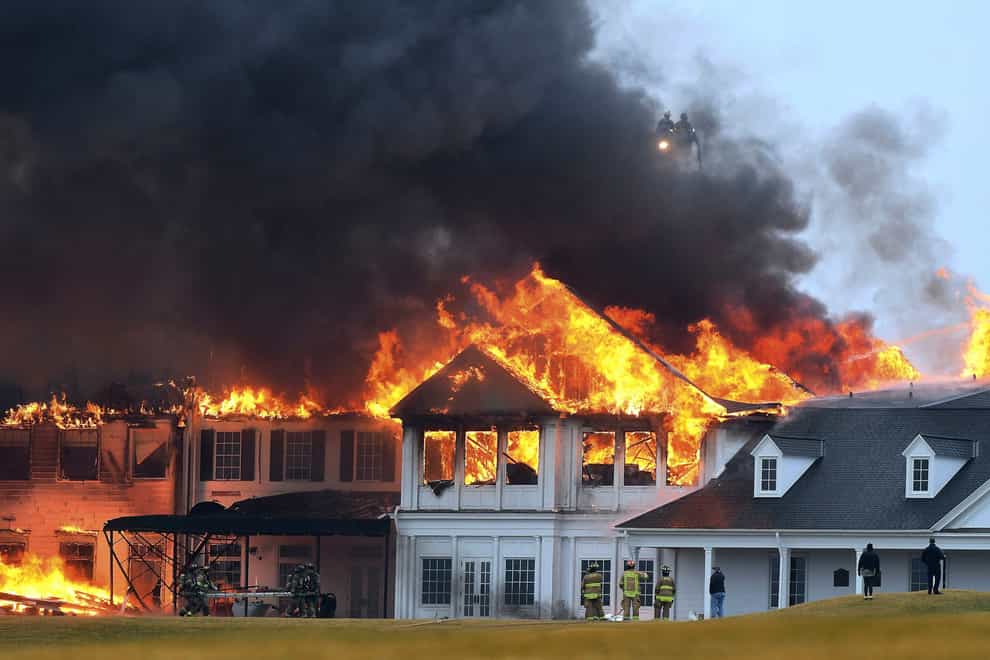 A fire burns at Oakland Hills Country Club (Daniel Mears /Detroit News via AP)