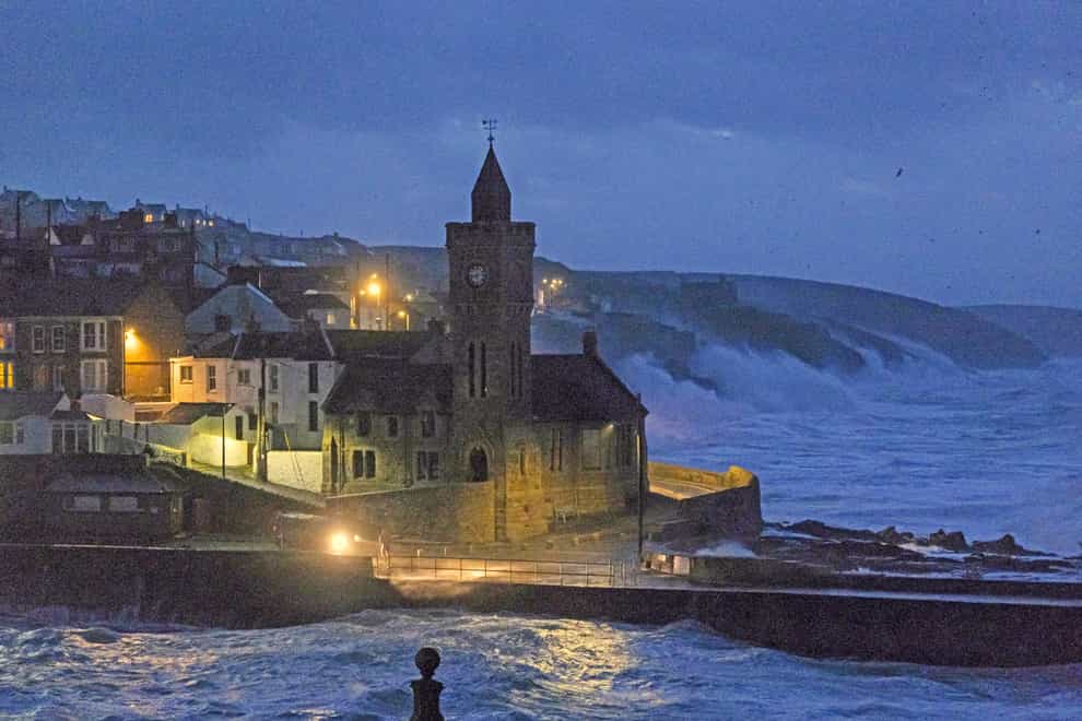 A rare red weather warning has been issued by the Met Office due to the combination of high tides, strong winds and storm surge (Matt Keeble/PA)