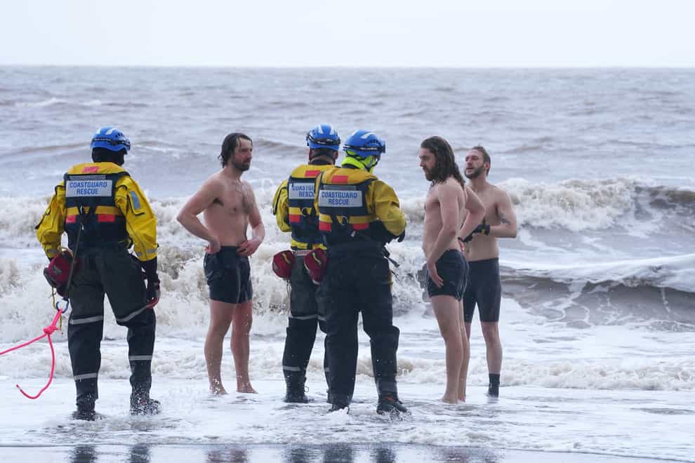 Three men ignored warnings and went for a swim in New Brighton, Merseyside, as Storm Eunice hit (Peter Byrne/PA)