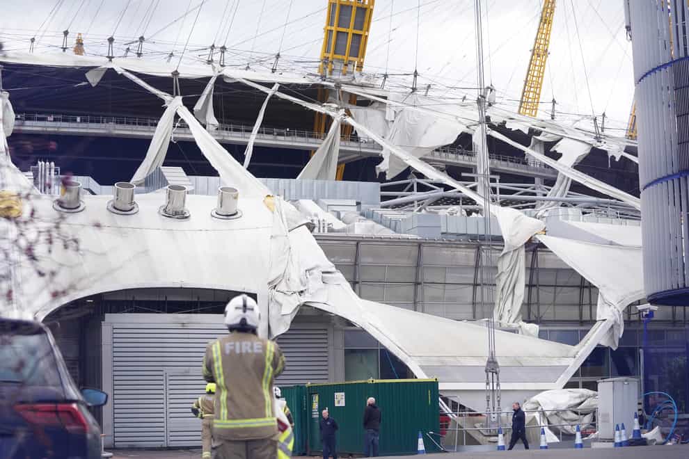 Emergency services look at the damage to the roof of the O2 in London (Stefan Rousseau/PA)