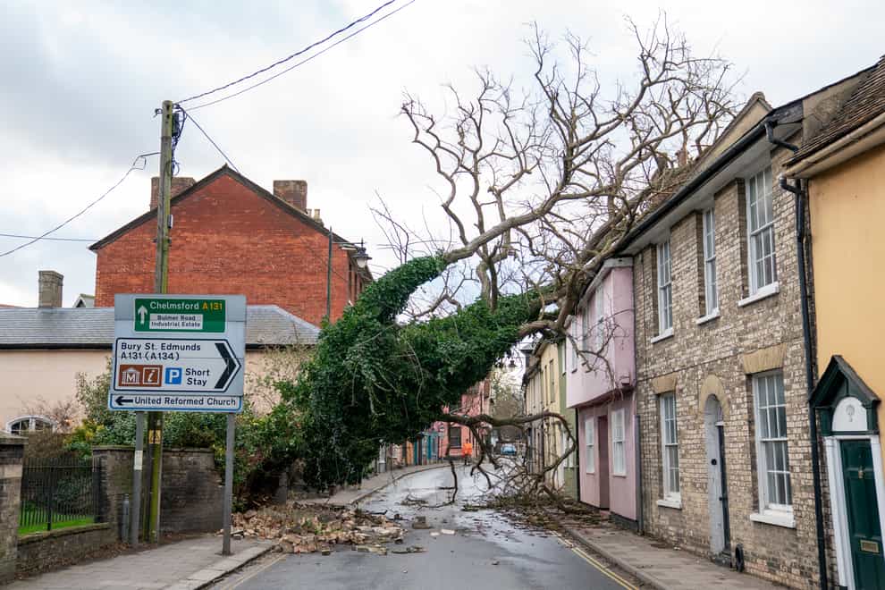 A fallen tree blocking the road in Sudbury, Suffolk, as Storm Eunice sweeps across the UK (Joe Giddens/PA)