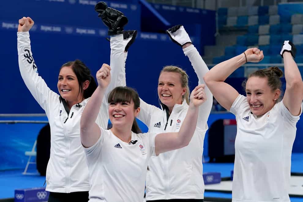 Eve Muirhead and her team celebrated reaching the Olympic final in Beijing (Andrew Milligan/PA)