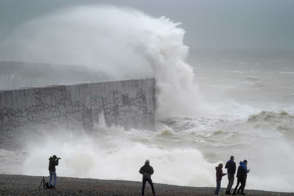 A wave crashes over the sea wall at West Quay in East Sussex, following on from Storm Eunice. More wet and windy weather is set to sweep the UK on Sunday as Storm Franklin is set to strike the UK just days after Storm Eunice destroyed buildings and left 1.4 million homes without power. Picture date: Sunday February 20, 2022.