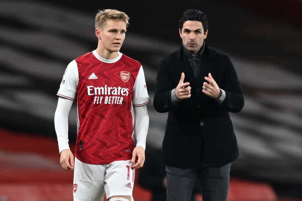 Arsenal manager Mikel Arteta instructs Arsenal’s Martin Odegaard before he goes on during the Premier League match at the Emirates Stadium, London. Picture date: Saturday January 30, 2021.