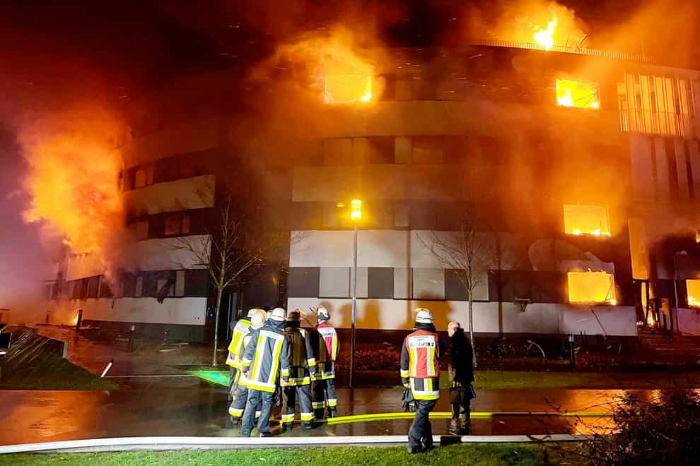 Firefighters battle a fire at residential complex in Essen Germany (KDF-TV/dpa via AP)