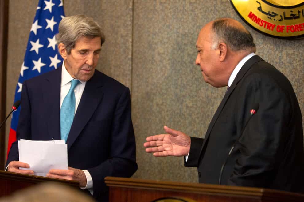 Egyptian foreign minister Sameh Shoukry and US special presidential envoy for climate John Kerry (AP)