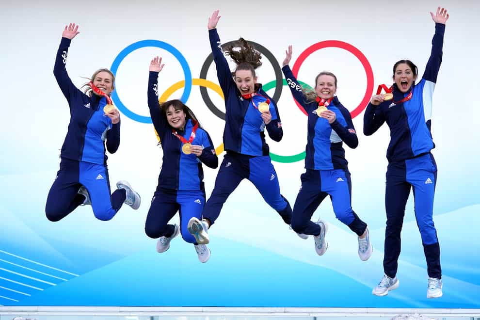 Great Britain’s Mili Smith, Hailey Duff, Jennifer Dodds, Vicky Wright and Eve Muirhead celebrate curling gold medal success at the 2022 Winter Olympic Games (Andrew Milligan/PA)