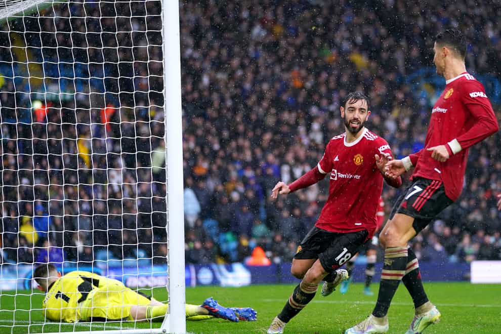 Bruno Fernandes (second right) celebrates scoring Manchester United’s second goal in their 4-2 win at Leeds (Mike Egerton/PA)