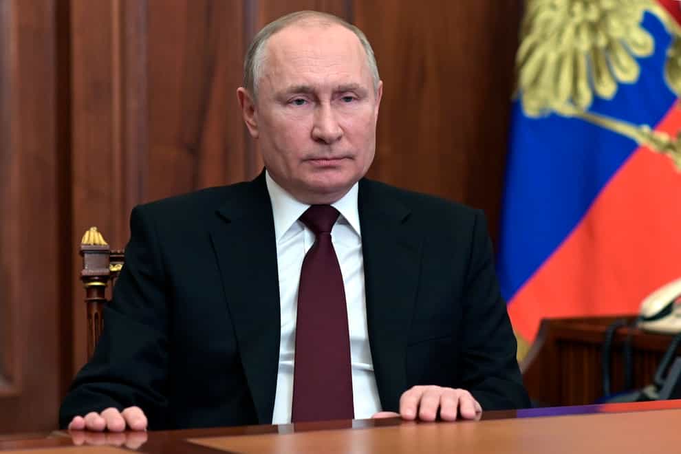 Russian President Vladimir Putin addresses the nation in the Kremlin (Alexei Nikolsky/AP)