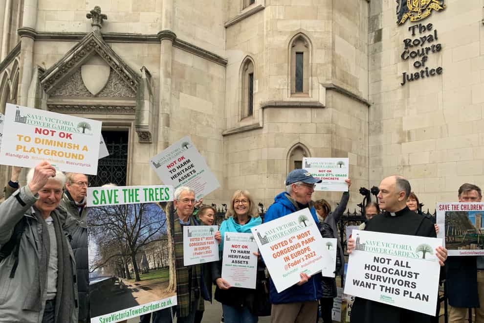 Protesters outside the Royal Courts of Justice in central London ahead of a hearing regarding the UK Holocaust Memorial (Tom Pilgrim/PA)