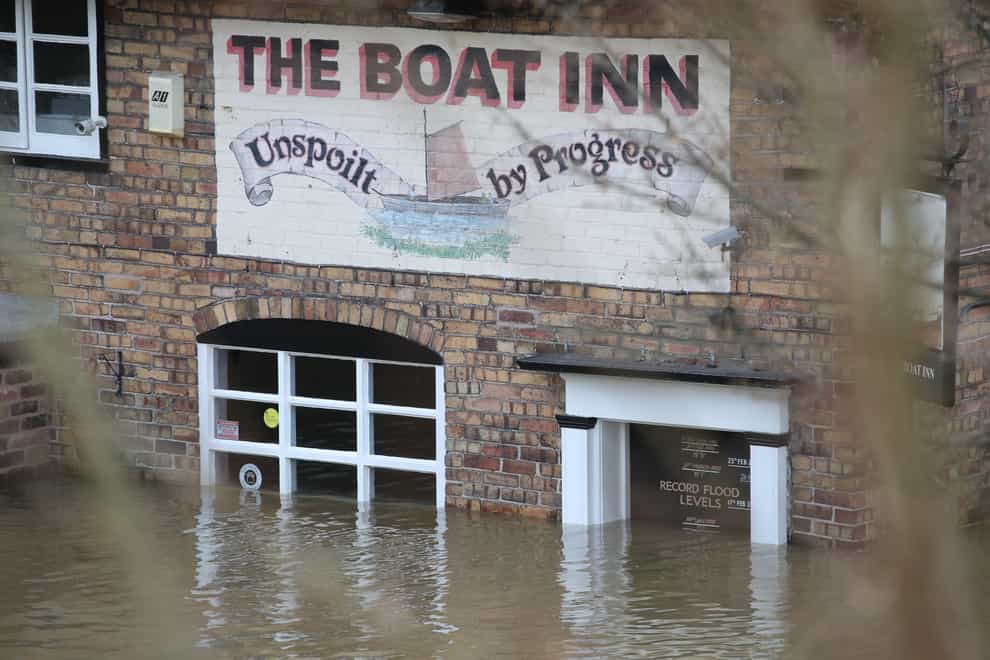 Flood waters from the River Severn surround The Boat Inn at Jackfield near Ironbridge, Shropshire, following high winds and wet weather (Nick Potts/PA)