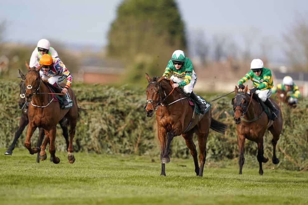 Any Second Now (white hat) went close in the Grand National (Alan Crowhurst/PA)