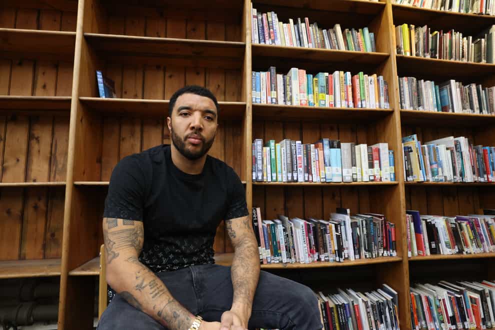 Footballer Troy Deeney at Brixton Library (James Manning/PA)