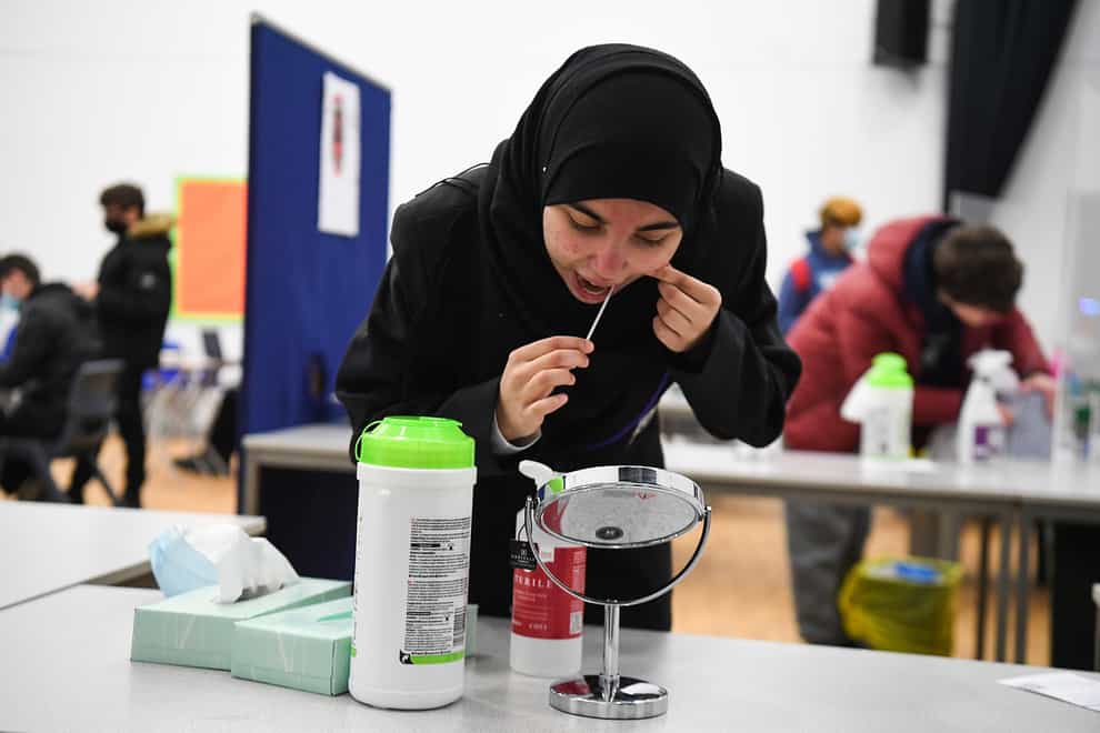 A student taking a lateral flow test at Hounslow Kingsley Academy in West London (Kirsty O’Connor/PA)