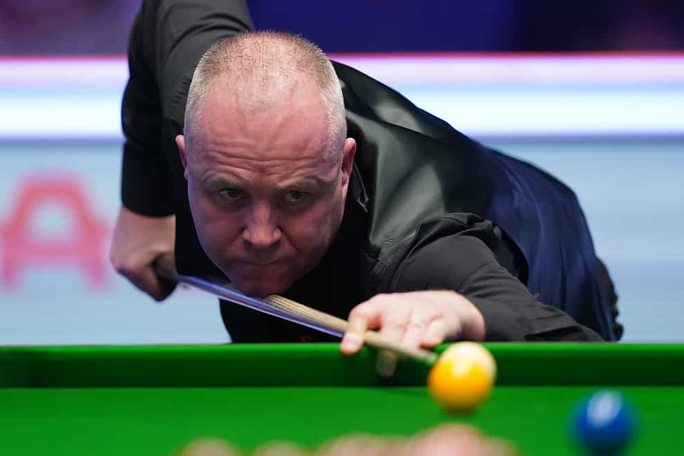 John Higgins suffered a rare 5-0 defeat by Tom Ford at the European Masters (Adam Davy/PA)