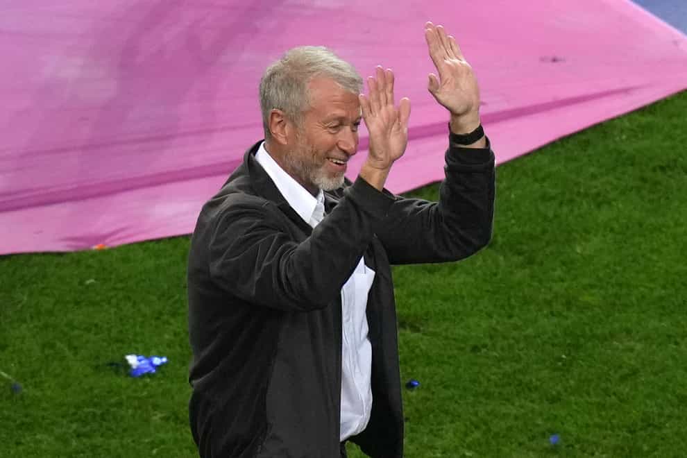 Chelsea owner Roman Abramovich celebrates on the pitch after the Uefa Champions League final match held at Estadio do Dragao in Porto, Portugal (Adam Davy/PA)