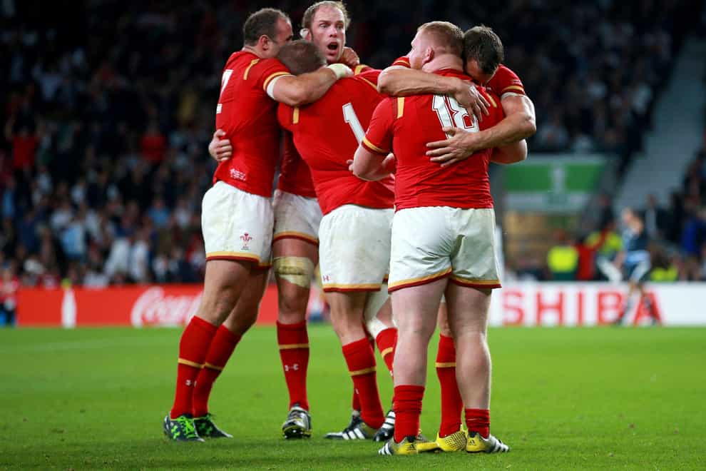 Wales players celebrate victory over England at Twickenham (David Davies/PA)