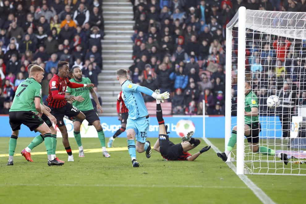 Bournemouth’s Jamal Lowe, second left, scores a late winner against Stoke (Steven Paston/PA)