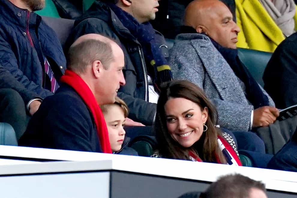 The Duke and Duchess of Cambridge and Prince George (PA)