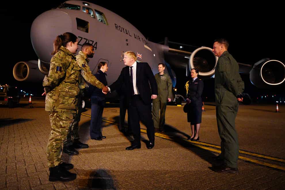 Prime Minister Boris Johnson meeting military personnel at RAF Brize Norton (Ben Birchall/PA)