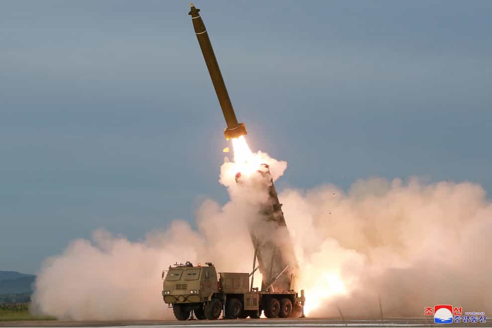 File photo of a test firing of an unspecified missile at an undisclosed location in North Korea (Korean Central News Agency/Korea News Service/AP)