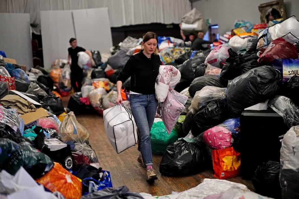 Volunteers at the Klub Orla Bialego (White Eagle Club) in Balham, south London, sort through donations (Aaron Chown/PA)