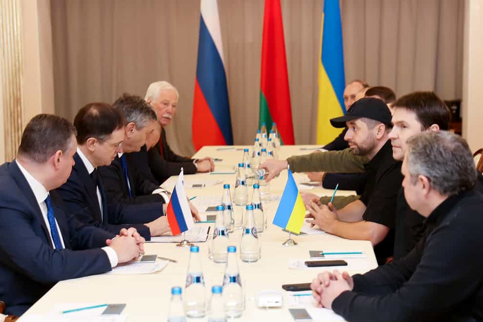 Vladimir Medinsky, the head of the Russian delegation, second left, and Davyd Arakhamia, faction leader of the Servant of the People party in the Ukrainian Parliament, third right, attend the peace talks in the Gomel region, Belarus (Sergei Kholodiin/AP)