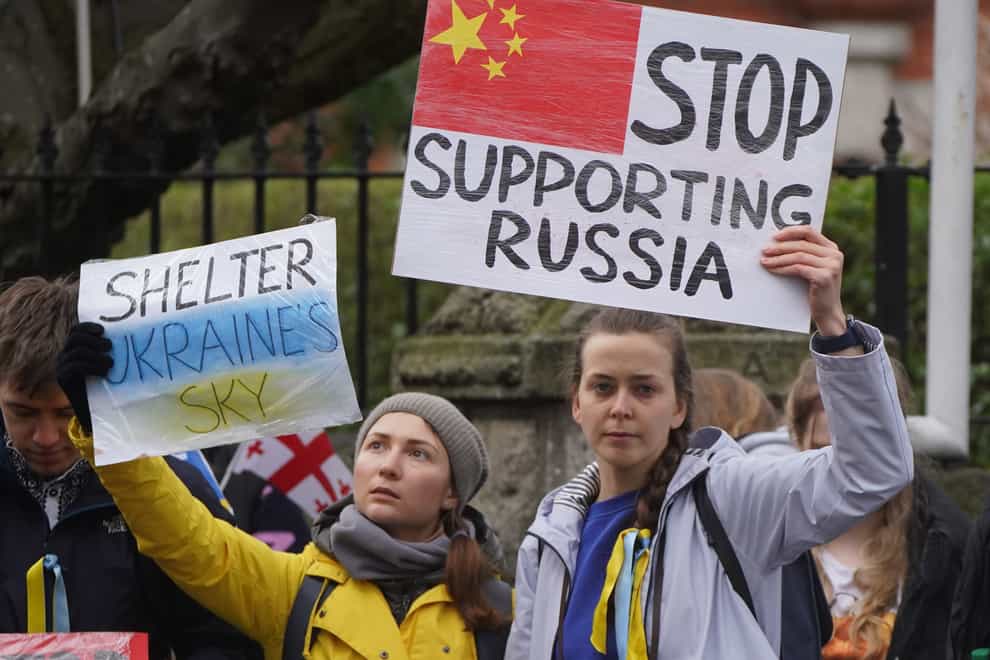 People protesting outside the Chinese Embassy in Dublin over the Russian invasion of Ukraine (Niall Carson/PA)