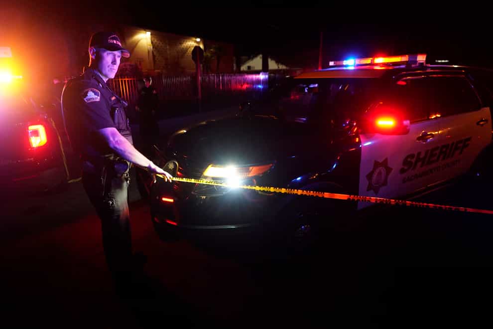 A man shot and killed his three daughters, their chaperone and himself during a supervised visit on Monday at a church in Sacramento, California, authorities said (Rich Pedroncelli/AP)