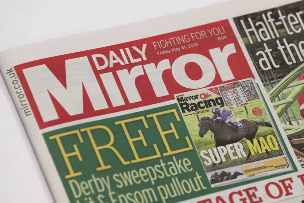 The publisher of the Mirror and Express newspapers has seen shares plunge as it warned that higher printing costs are set to impact profits this year (Jonathan Brady/PA)