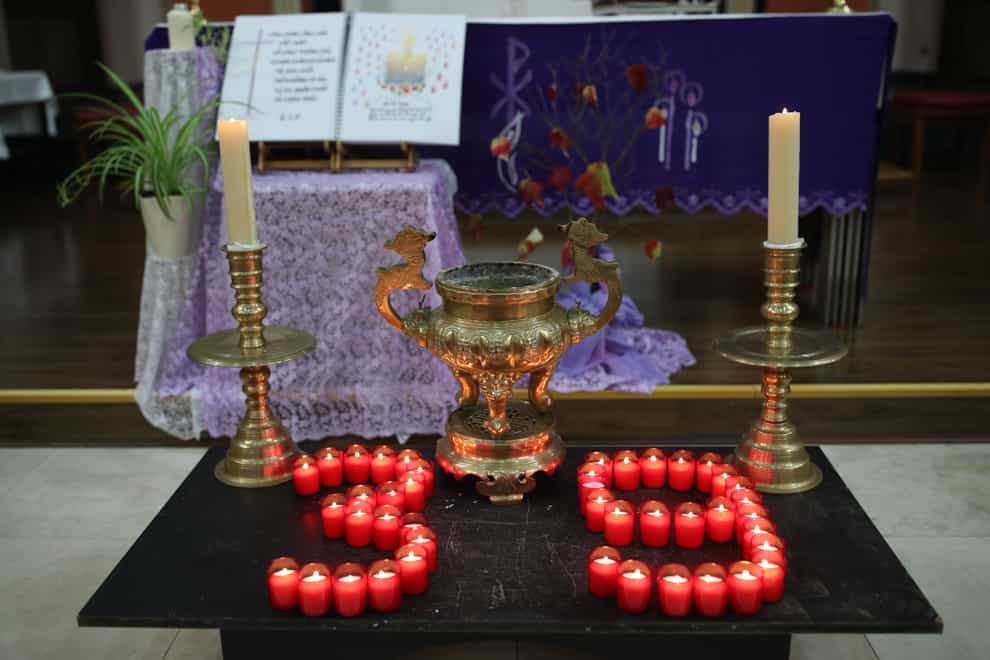 Candles laid out as part of the ceremony for the mass prayer and vigil for the 39 victims found dead inside the back of a truck in Grays, Essex, at the Holy Name and Our Lady of the Sacred Heart Church, London’s Vietnamese church, in east London (Yui Mok/PA)