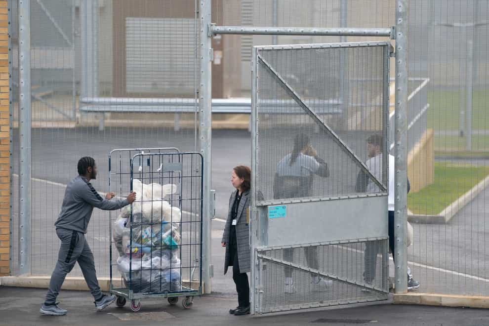 Prisoners carry out jobs at category C prison HMP Five Wells in Wellingborough (Joe Giddens/PA)