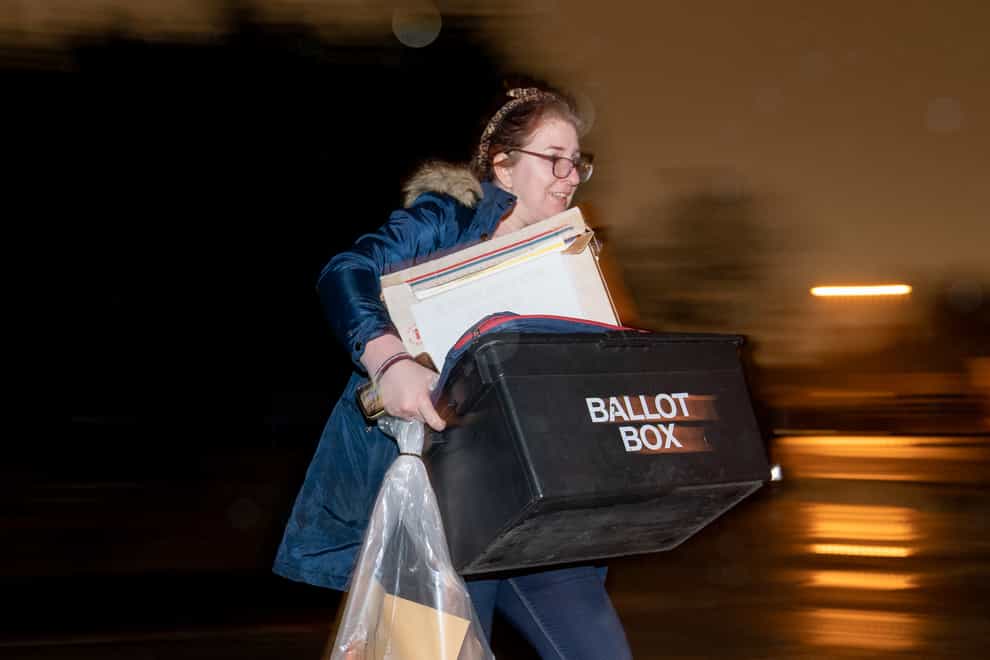 The first ballot boxes arrive at Erdington Academy ahead of the count (PA)