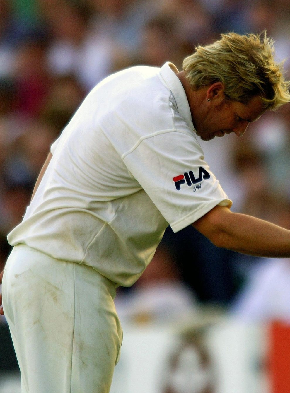 Australia’s Shane Warne bows to spectators after they show appreciation for his five Ashes wickets against England at the Oval in 2005 (Rui Vieira/PA)
