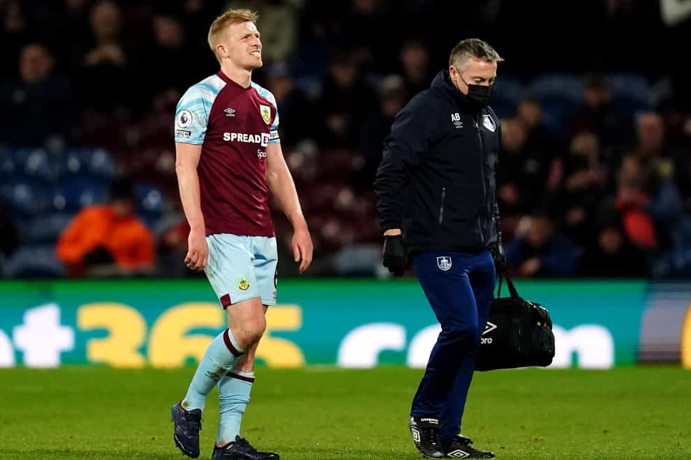 Ben Mee (left) sustained a knee issue in Burnley’s loss to Leicester (Martin Rickett/PA).