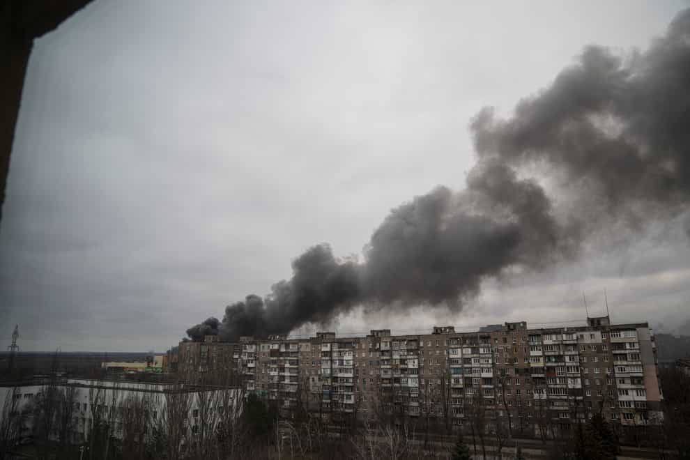 Smoke rises after shelling by Russian forces in Mariupol, Ukraine (Evgeniy Maloletka/AP)