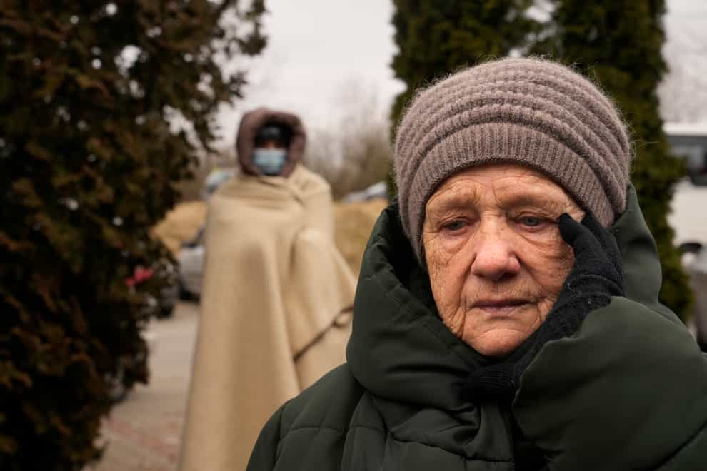 A Russian official said safe corridors will open on Sunday to allow civilians to flee two Ukrainian cities (Markus Schreiber/AP)