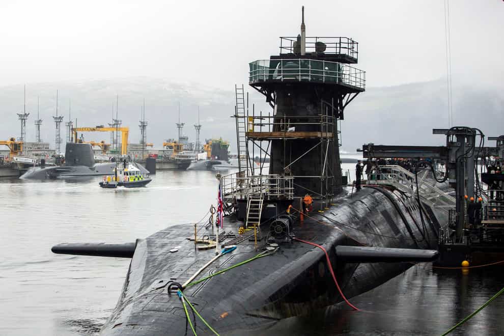 Vanguard-class submarine HMS Vigilant (front right), one of the UK’s four nuclear warhead-carrying submarines, with Astute-class submarines HMS Artful (back left) and HMS Astute (back 2nd left) at HM Naval Base Clyde, also known as Faslane (Danny Lawson/PA)