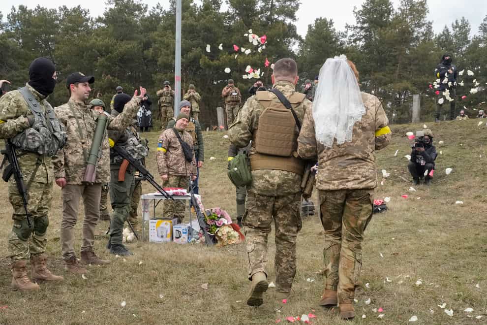The couple married at a Kyiv checkpoint (Efrem Lukatsky/AP)