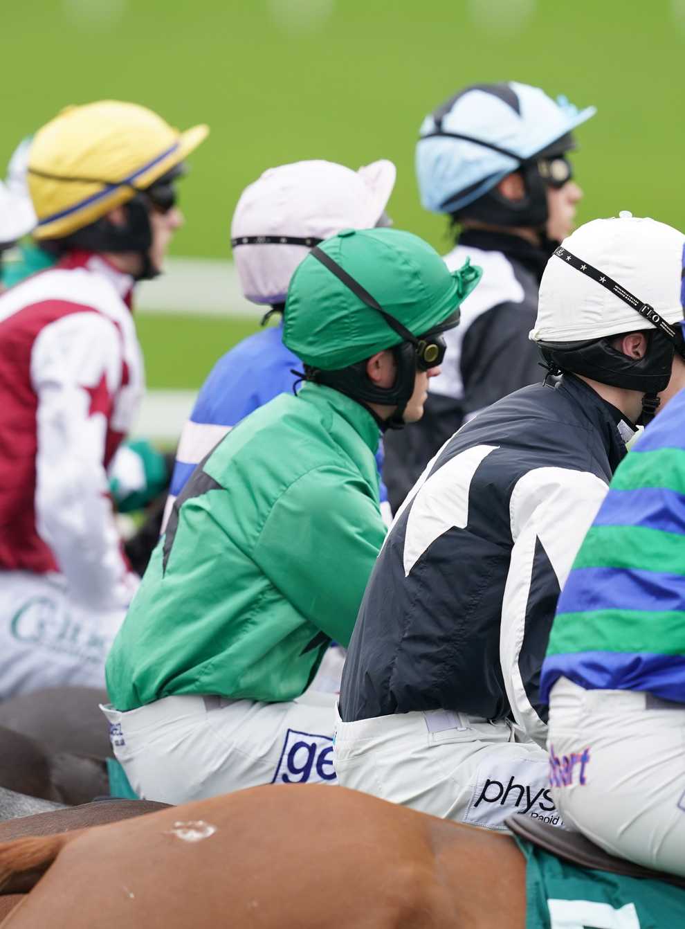 Runners and Riders wait to start ahead of NHS Vaccinating Heroes Conditional Jockeys’ Handicap Hurdle at Cheltenham racecourse. Picture date: Saturday October 23, 2021.