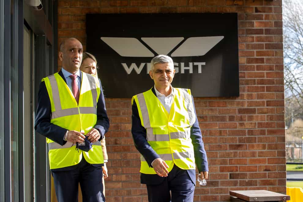 Sadiq Khan, right, speaking with Buta Atwal, CEO of Wrightbus (Liam McBurney/PA)