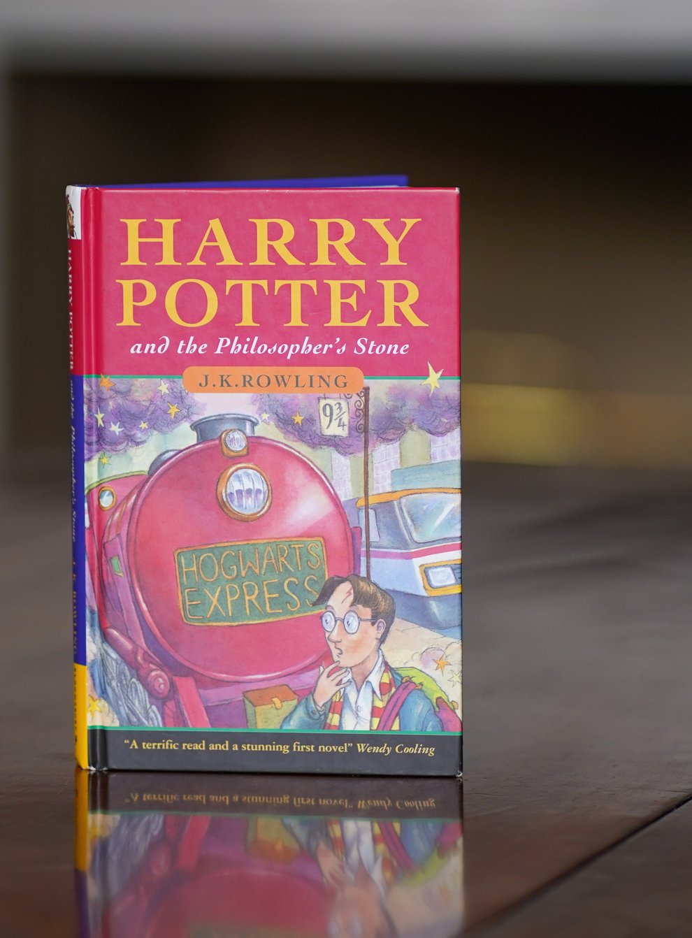 A near-perfect copy of the first edition hardback of JK Rowling’s Harry Potter And The Philosopher’s Stone (Jacob King/PA)