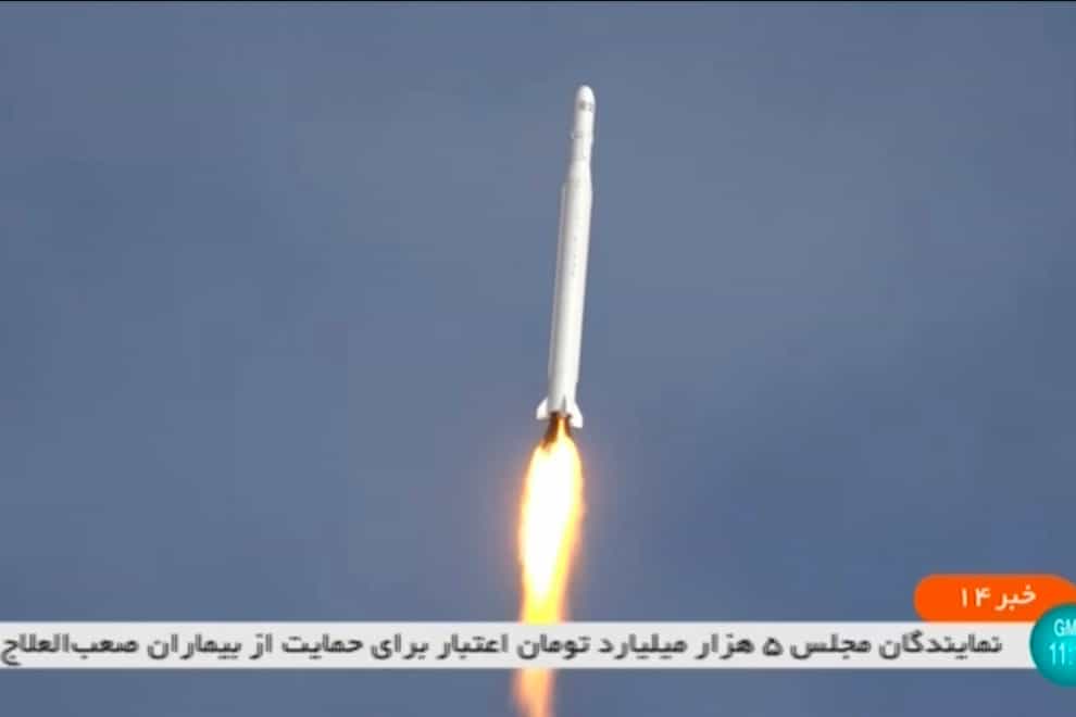 This image taken from video footage aired by Iranian state television on Tuesday, March 8, 2022, shows the launch of a rocket by Iran’s Revolutionary Guard carrying a Noor-2 satellite in northeastern Shahroud Desert, Iran. Iran launched the reconnaissance satellite just as world powers awaited Tehran’s decision in negotiations over the country’s tattered nuclear deal. (Iranian state television via AP)