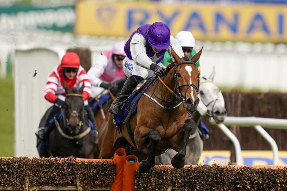 Bryan Cooper riding Mrs Milner clears the last to win The Pertemps Network Final Handicap Hurdle during day three of the Cheltenham Festival at Cheltenham Racecourse (Alan Crowhurst/PA)