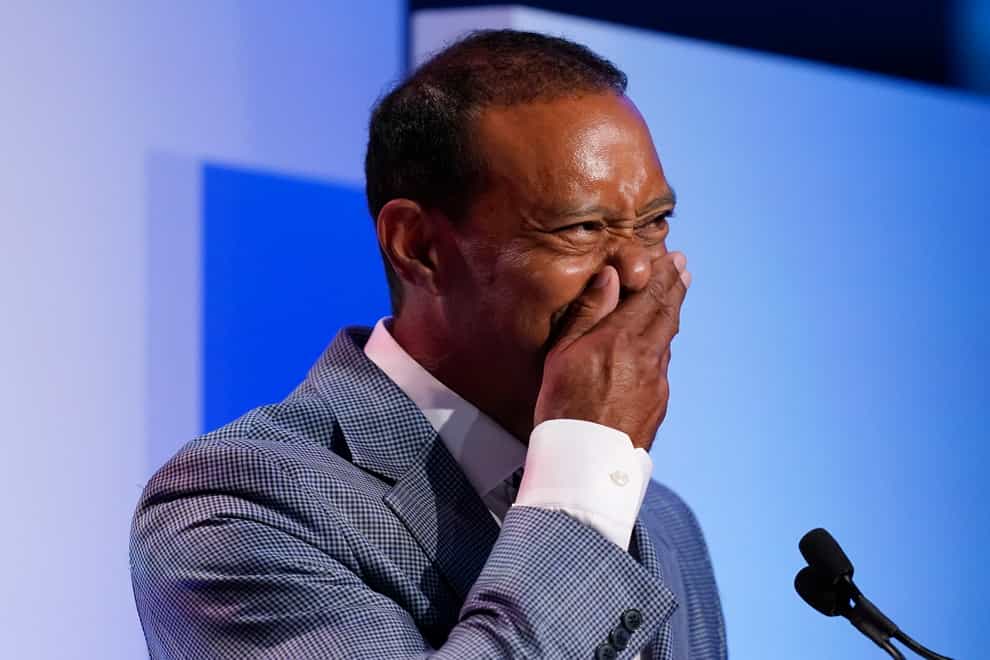 Tiger Woods becomes emotional during his induction into the World Golf Hall of Fame on Wednesday on night (Gerald Herbert/AP)