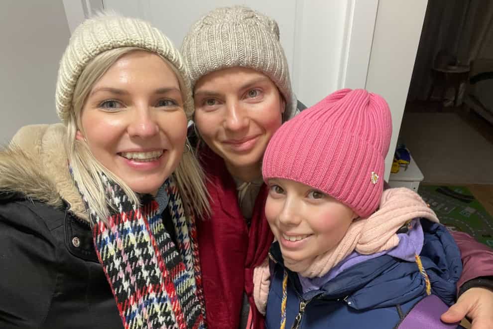 Alice Mishchenko (left) with her sister Oksana (centre) and Oksana’s daughter Sofiia after the trio were reunited on Monday (Alice Mishchenko/PA)