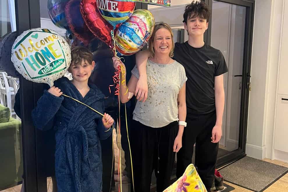 Nicola Sharpe with her sons after spending 190 days in hospital (Royal Papworth Hospital/PA)