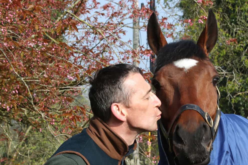 Davy Russell gives Tiger Roll a kiss (PA Media)