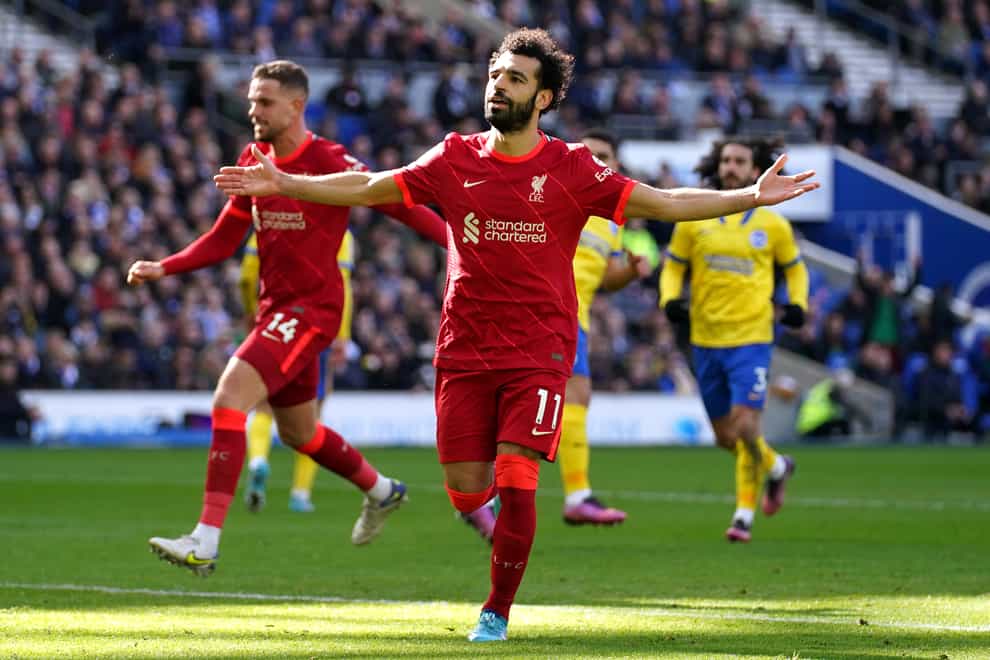 Liverpool moved within touching distance of Manchester City at the summit of the Premier League after a 2-0 win at Brighton (Nick Potts/PA)